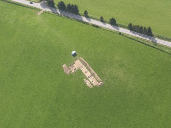 Oblique aerial view centred on the excavation of the enclosures at Barflat, Rhynie, taken from the ENE.