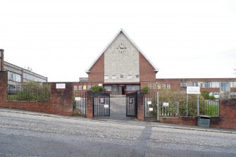General view from outside gates to SE