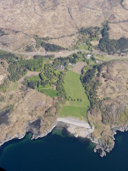 General oblique aerial view of Arisaig House and Borrodale House with the site of Prince Charlie's Cave in the foreground, taken from the SSW.
