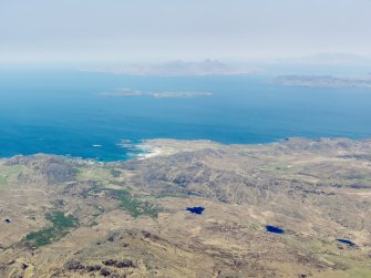 General oblique aerial view of the Islands of Muck, Eigg, Rum and Skye, taken from the SSE.