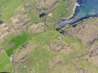 Oblique aerial view of the remains of Sean Bhaile, Muck, taken from the WNW.