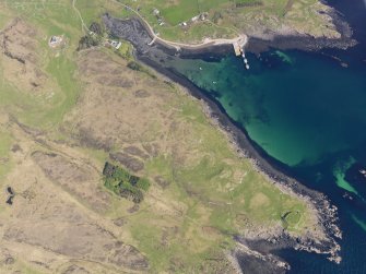 Oblique aerial view of the remains of the fort and the pier, taken from the SW.