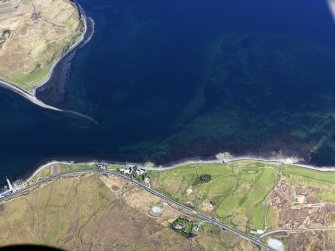 Oblique aerial view of the remains of fish traps near the Sconser golf course and quarry, Skye, taken from the SE.