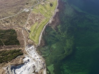 General oblique aerial view of the remains of fish traps near Sconser golf course and quarry, and the remains of Achadh Mor township, field system and lazy beds, Skye, taken from the E.