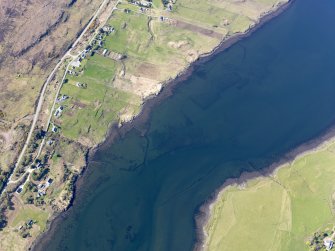Oblique aerial view of the remains of the fish traps and kelp grids in Loch Snizort, taken from the SE.