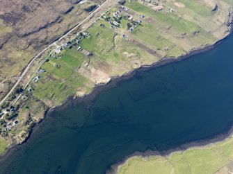 Oblique aerial view of the remains of the fish traps and kelp grids in Loch Snizort, taken from the ESE.