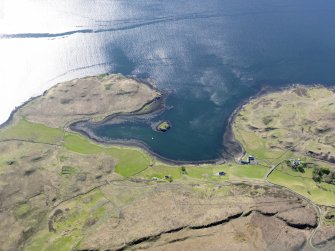 General oblique aerial view of the remains of the fort at Dun Maraig and the remains of the township, field system, enclosures and lazy beds at Cuidrach, Skye, taken from the E.