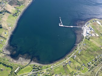 Obligue aerial view of King Edward Pier, the township of Idrigil and the nearby  remains of a fish trap, Uig, Isle of Skye, taken from the NNE.