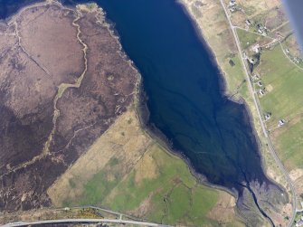 Oblique aerial view of the remains of a fish trap at Lon Beatha, near Edinbane, Isle of Skye, taken from the SW.