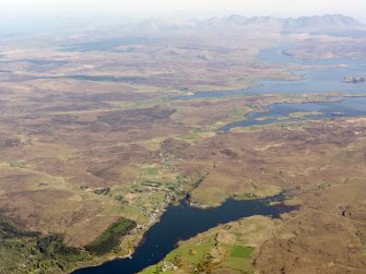 General oblique aerial view of Dunvegan and Kilmuir, looking SE towards the Cuillins, Isle of Skye, taken from the NW.