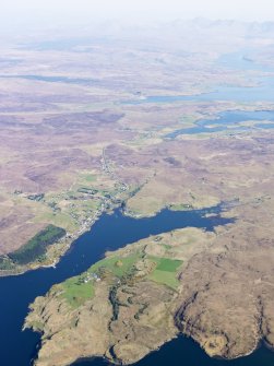 General oblique aerial view of Dunvegan and Kilmuir, looking SE towards the Cuillins, Isle of Skye, taken from the NW.