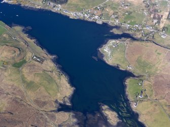 Oblique aerial view of the remains of a series of fish traps around the head of Loch Dunvegan near Kilmuir, Isle of Skye, taken from the SSW.