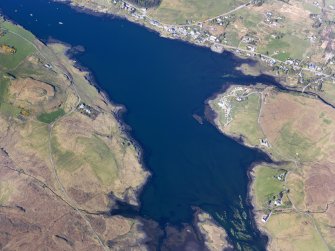 Oblique aerial view of the remains of a series of fish traps around the head of Loch Dunvegan near Kilmuir, Isle of Skye, taken from the SSW.