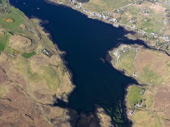 Oblique aerial view of the remains of a series of fish traps around the head of Loch Dunvegan near Kilmuir, Isle of Skye, taken from the SSW.