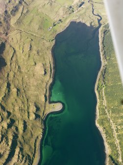 Oblique aerial view of the remains of the township, field system and lazy beds at Faolainn and the remains of a series of fishtraps at the head of Loch Eynort, Isle of Skye, taken from the S.