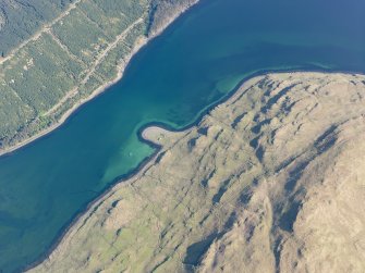 Oblique aerial view of the remains of the township, cultivation remains and fish traps at Faolainn, Isle of Skye, taken from the ESE.