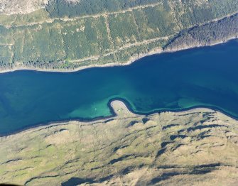 Oblique aerial view of the remains of the township, cultivation remains and fish traps at Faolainn, Isle of Skye, taken from the W.