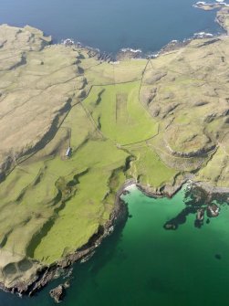 General oblique aerial view of Na h-Athannan, Canna, taken from the SSW.