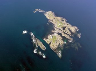 Oblique aerial view of Oigh-Skeir and the Hyskier lighthouse, taken from the SW.