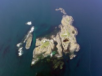 Oblique aerial view of Oigh-Skeir and the Hyskier lighthouse, taken from the S.