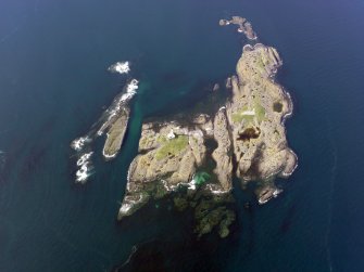 Oblique aerial view of Oigh-Skeir and the Hyskier lighthouse, taken from the SSE.