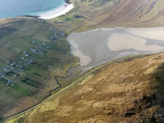 Oblique aerial view of the remains of the township, field system, lazy beds and fish trap at Northton, Harris, taken from the SE.