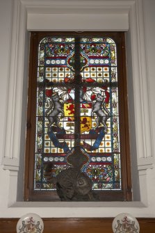 Interior.  First floor, upper hall, detail of stained window above fireplace