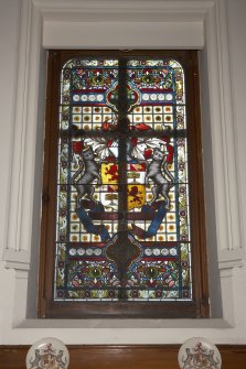 Interior. First floor, upper hall, detail of stained window above fireplace