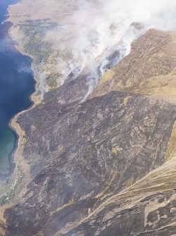 Oblique aerial view of the wild fire on the S flank of Sgorr a' Chadail, taken from the ESE.