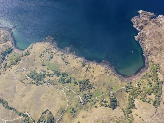 Oblique aerial view centred on the remains of the two fish traps, taken from the N.