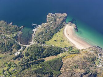 Oblique aerial view centred on Gairloch golf course, taken from the NE.