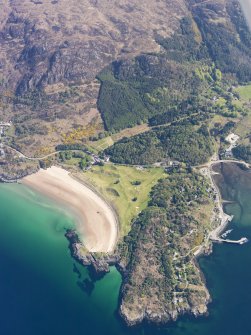 Oblique aerial view centred on Gairloch golf course, taken from the WSW.