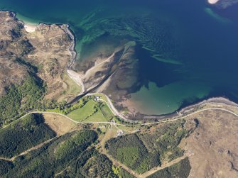 Oblique aerial view centred on the bay at Gruinard House and the remains of the fish trap, taken from the E.