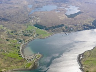 General oblique aerial view looking across Aird Point and Drumchork towards the oil storage depot, taken from the W.