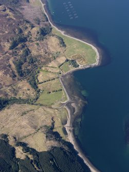 General oblique aerial view of the remains of the fish trap with Ardintoul House beyond, taken from the E.