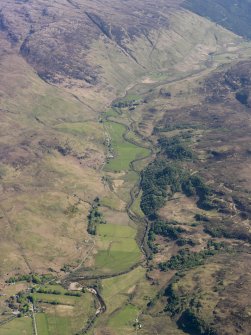 General oblique aerial view looking along the line of the Military Road in Glen More, taken from the W.