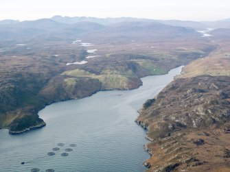 General oblique aerial view looking along Loch Odhairn towards Grabhir with the fish farm in the foreground, taken from the ENE.
