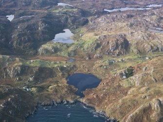 Oblique aerial view centred on Loch Dubh and Calbost township, taken from the E.