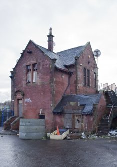 View of fire damaged side and rear elevations of former station taken from the north
