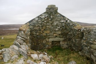 Unst, Lochside. View of fireplace in north gable.