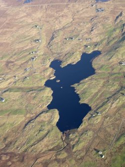 General oblique aerial view of the remains of the Crannogs in Loch An Eilean and the remains of the township of South Boisdale, taken from the WSW.