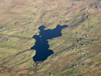 General oblique aerial view of the remains of the Crannogs in Loch An Eilean and the remains of the township of South Boisdale, taken from the WSW.