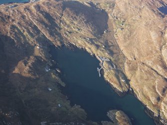 Oblique aerial view of the remains of the township of Acairseid and nearby lazy beds, looking towards the remains of the township of Coileag, Eriskay, taken from the SSE.