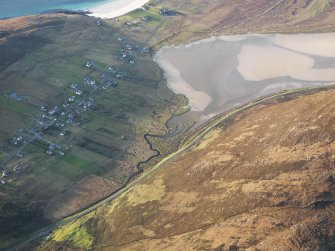 Oblique aerial view of the remains of the township, field system, lazy beds and fish trap at Northton, Harris, taken from the SE.