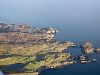 General oblique aerial view of the remains of the township of Rodel and the nearby remains of nausts, elnclosures, a head dyke and lazy beds, Harris, taken from the W.
