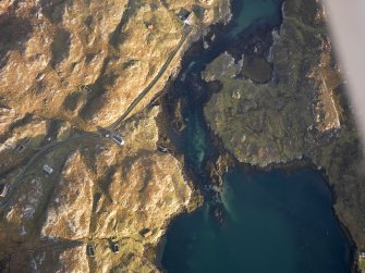 Oblique aerial view of the remains of the eastern end of the township of Manish including the possible remains of a horizontal mill, the remains of the township of Ardslave and the nearby remains of dykes and lazy beds, Harris, taken from the WNW.