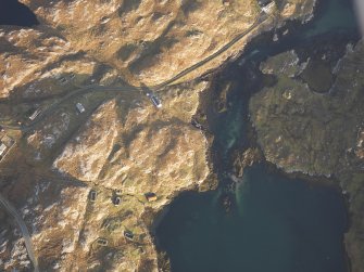 Oblique aerial view of the remains of the eastern end of the township of Manish including the possible remains of a horizontal mill, the remains of the western end of the township of Ardslave and the nearby remains of dykes and lazy beds, Harris, taken from the W.