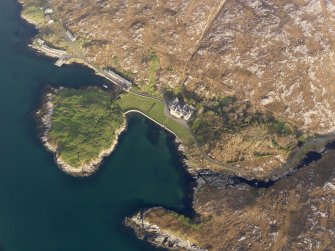 Oblique aerial view centred on Amhuinnsuidhe Castle, taken from the S.