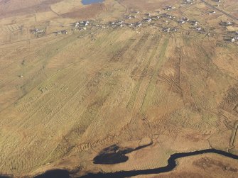 Oblique aerial view of the township of Arnol, taken from the W.