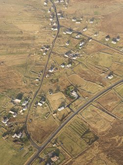 Oblique aerial view of the township of Arnol, taken from the SSW.